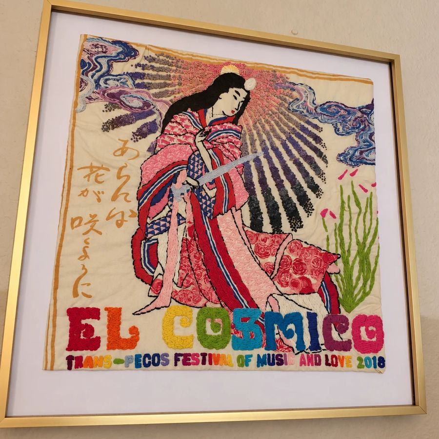 Framed embroidered El Cosmico Trans-Pecos Festival 2018 bandana with a woman in a kimono